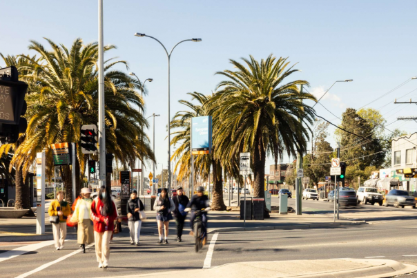 Photo of a sunny day showing a busy community atmosphere around Springvale Station 